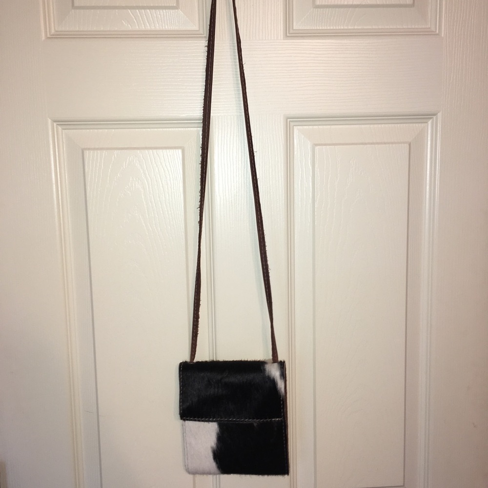 Cow hair on hide purse